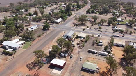 aerial view of a car crossing an intersection in a small country town in the australian outback