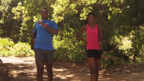 woman and man are finishing their jogging