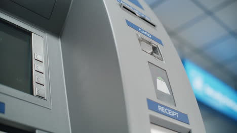 person using an atm machine