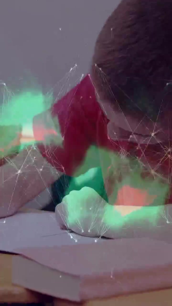 Vertical video: Globe appearing, red-shirt child leaning, writing, globe morphing, completing work