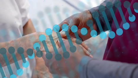 animation of dna strand rotating over diverse male doctor massaging hand of senior female patient