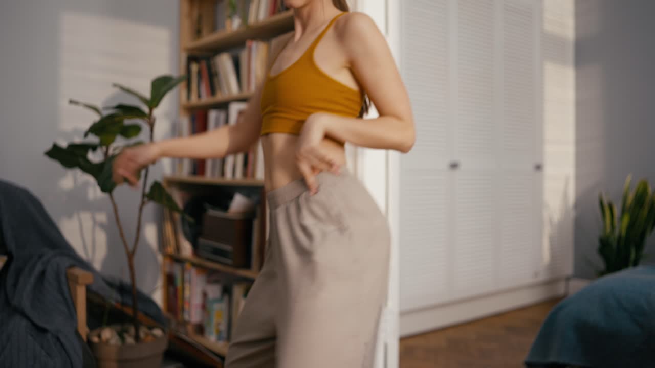 Woman dancing in a room