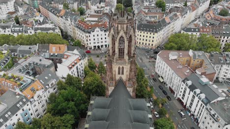 4k aerial footage of the historic saint martin church and surrounding area in cologne, germany