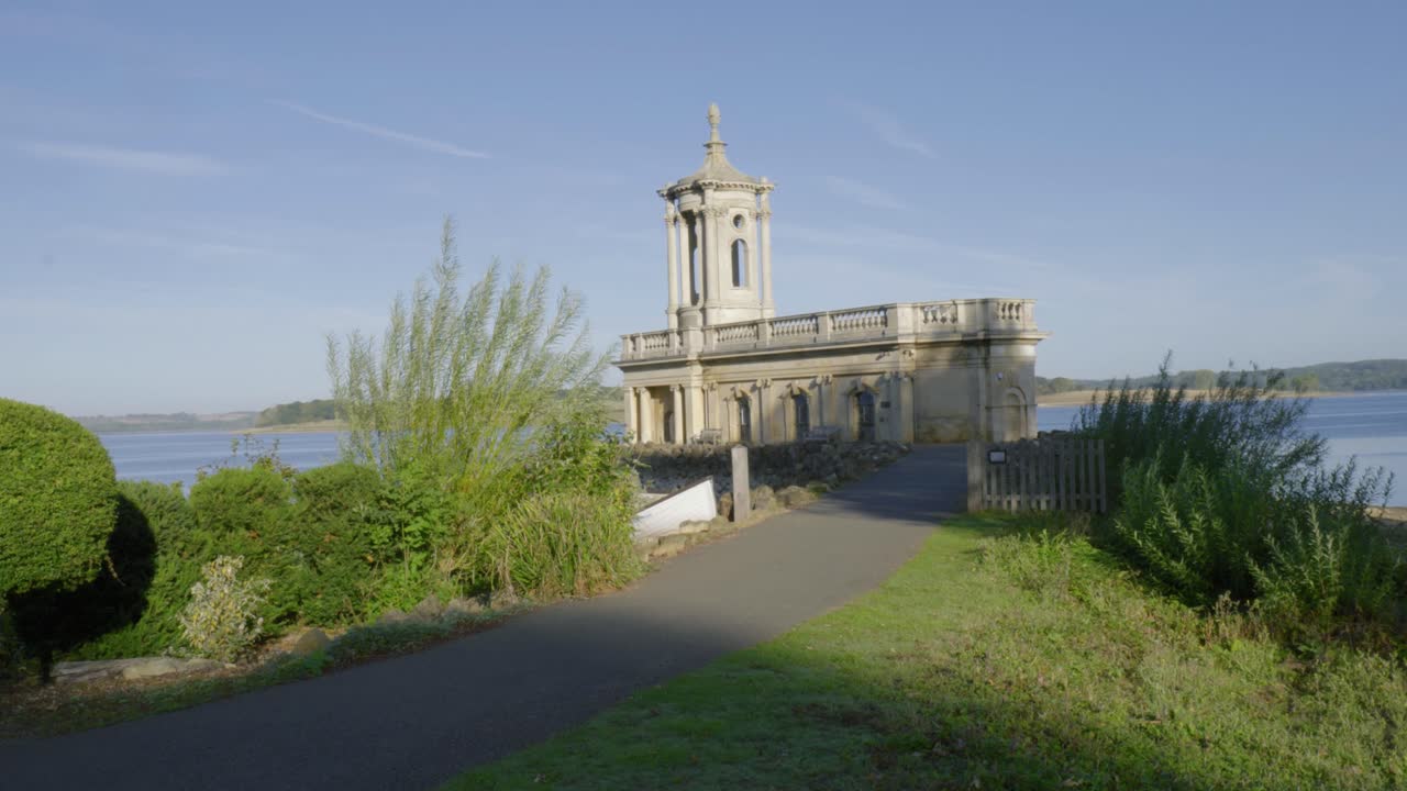 View of Normanton Church by Rutland Water, serene and inviting location