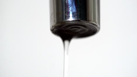 close-up of a dripping faucet