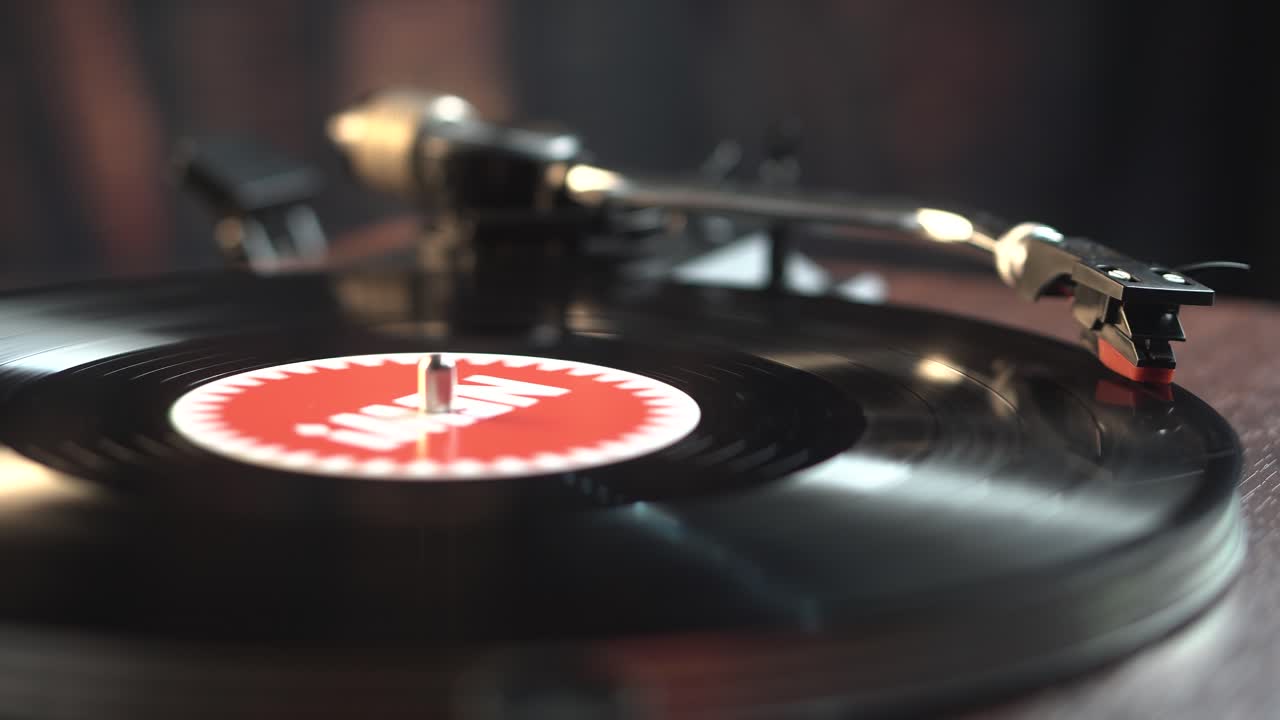 Starting Playback of Vinyl Record With New Music on 1980's Turntable