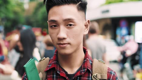 Handheld-video-shows-of-young-Vietnamese-man-holding-passport