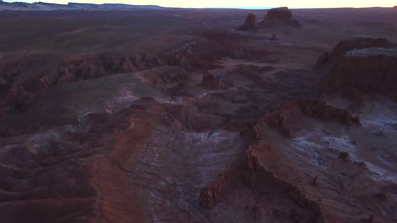Aerial tilt down of large sprawling desert in Utah