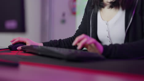Keyboard,-pc-gamer-and-woman-hands-in-gaming-neon