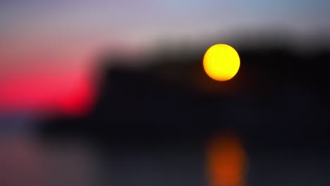 blurred background of black yellow flashing beacon