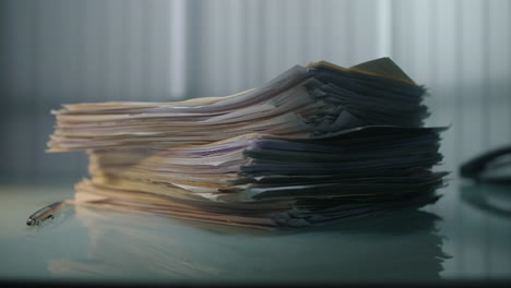 stack of papers on a desk