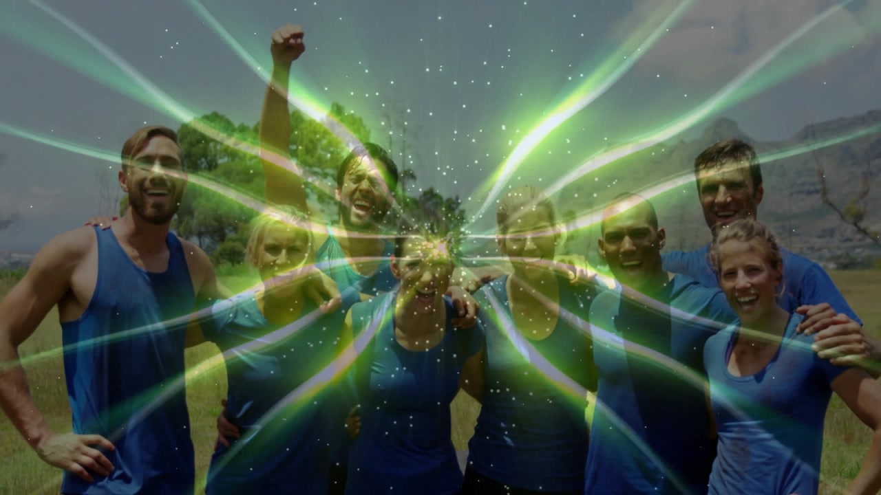 Sports team standing in grassy meadow, green glow intensifying into beams boosting team energy