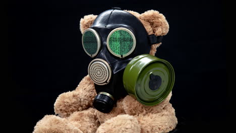 teddy bear wearing a gas mask