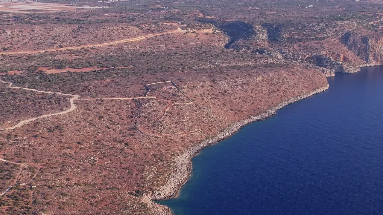 Aerial View of Rugged Mediterranean Coastline and Deep Blue Sea