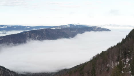 static shot of beautiful valley with low hanging clouds