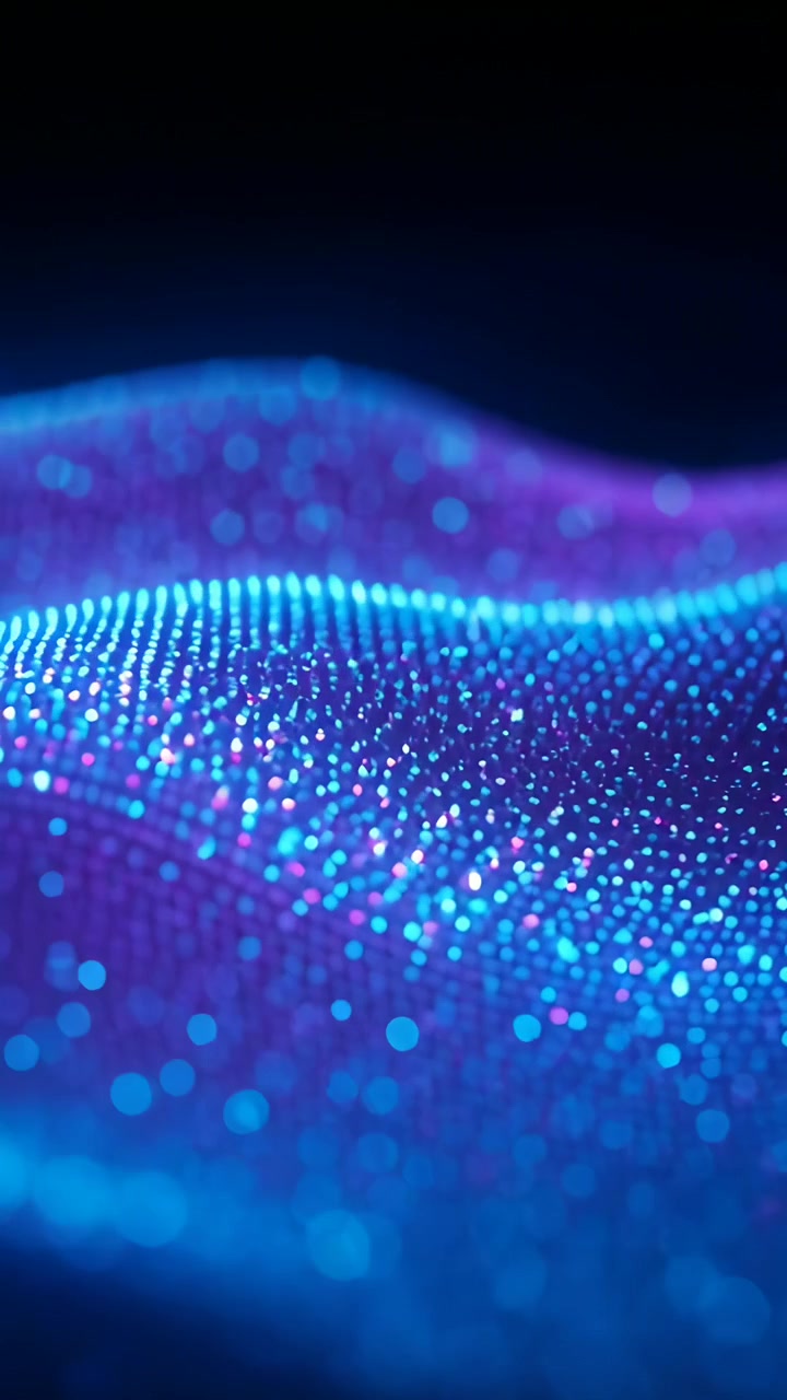 Vertical video: Panning camera revealing luminous mesh undulating over dark gradient, bokeh pulsing