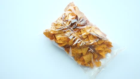 tortilla chips in a plastic bag