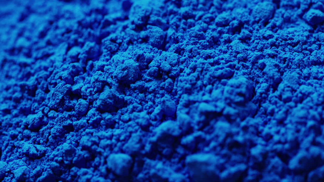 복사 공간과 함께 파란 가루의 클로즈업 비디오