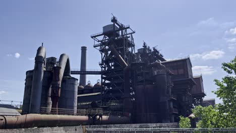 dark-steel-blast-furnace-5-in-landscape-park,-historic-factory-industrial-site-old-in-germany