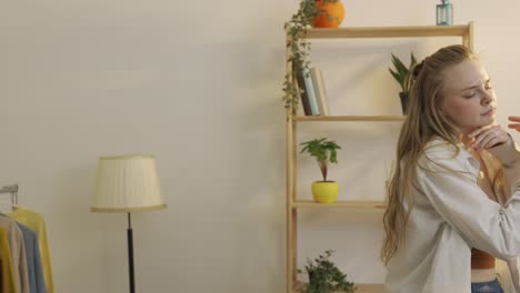 young woman dancing at home