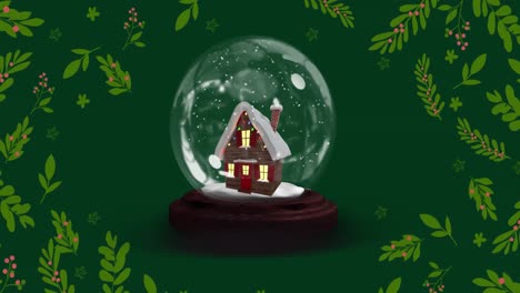 Animation-of-snow-globe-with-house-at-christmas-over-leaves