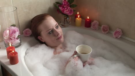 woman relaxing in jacuzzi bath