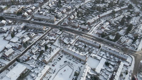 flying high over small town in winter