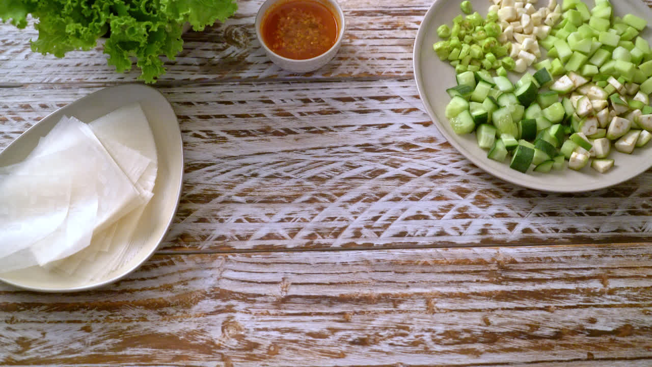 Vietnamese pork meatball with vegetables wraps (Nam-Neaung or Nham Due) - vietnamese traditional food culture