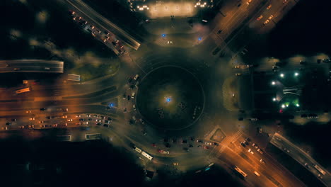 aerial view round abound with traffic at night , bucharest romania