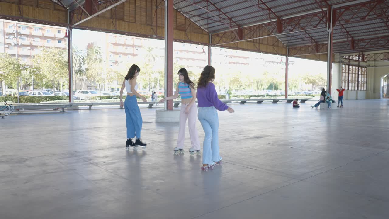 Three Women Roller Skating in an Outdoor Market