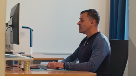 busy european dutch caucasian white man male adult model working in the office job on desktop workspace and feels very tired exhausted and drained with fatigue, digital film look