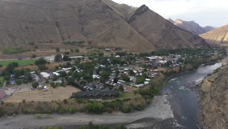 aerial view of a small town nestled in a mountain valley