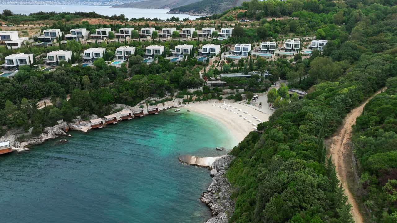 Lux beach resort with private villas and turquoise sea in Saranda, Albania