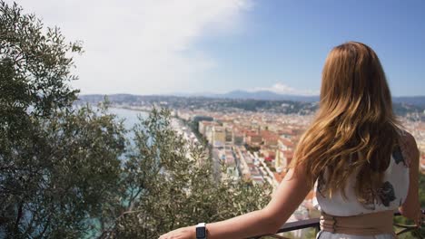 smilling young traveller exploring nice on a beautiful sunny day