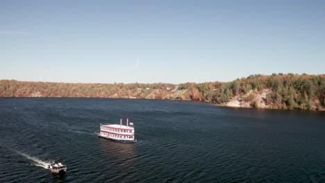 au sable river queen boat on the au sable river in michigan with drone video pulling out