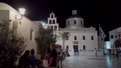 people around church in akrotiri