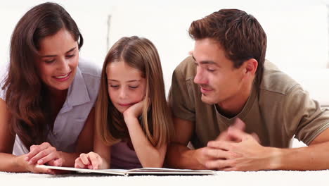 family reading a book