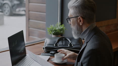 businessman working in a coffee shop