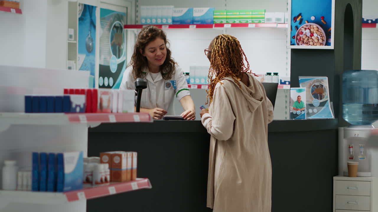 Pharmacy checkout with woman customer
