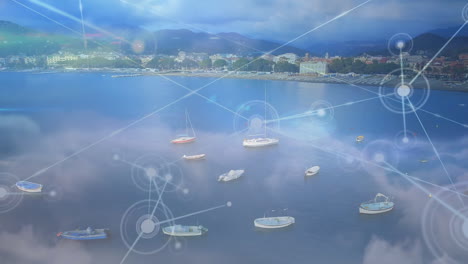 animation of moving network of connections, over beautiful coastal landscape