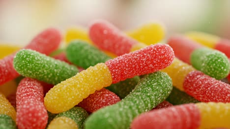 a close-up view of colorful fruit-flavored gummies displaying vivid colors, textures, and sugar coating, perfect for candy enthusiasts and sweet treat lovers