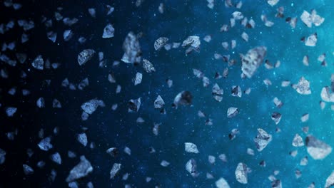 volando muchos asteroides en el fondo del espacio profundo. explosión de salpicaduras rotas. el cielo estrellado. animación 3d de meteoritos girando. animación de bucle.