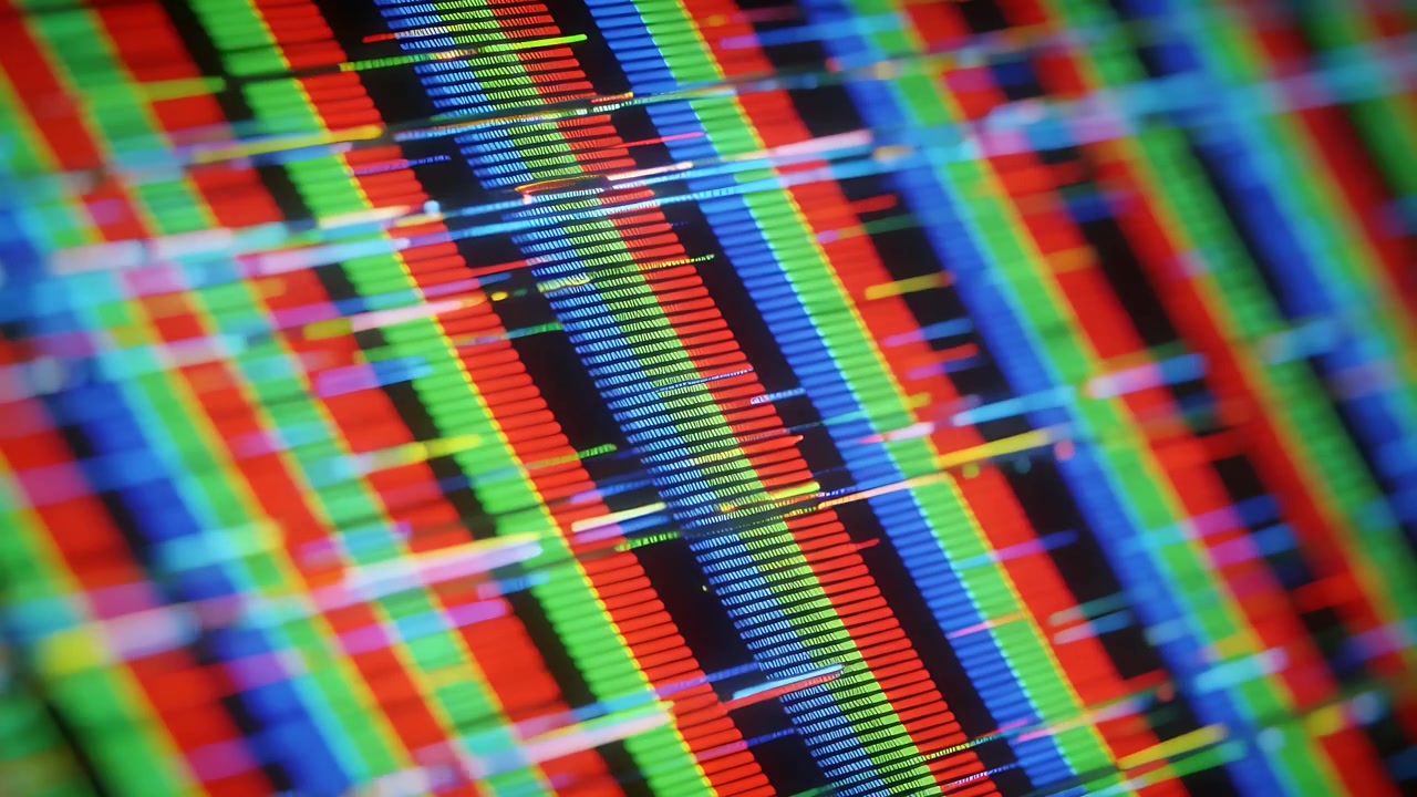 Shifting display showing RGB subpixel grid at macro revealing scan lines from camera motion