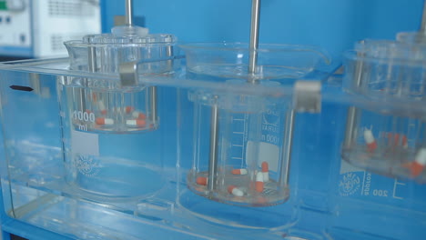 medication pill in a dissolution apparatus during testing