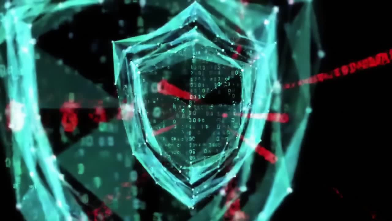 A dynamic display of a digital shield illustrating cybersecurity challenges. Red coding represents threats while the shield emphasizes protection. The focus is on technology and safety.
