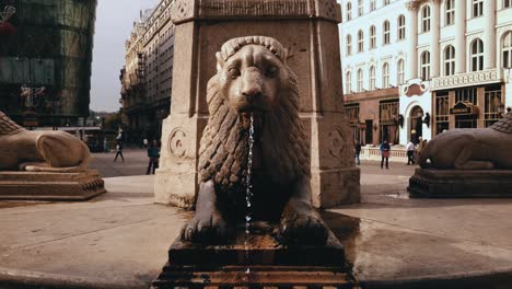 One-of-four-lion-fountains-at-Vörösmarty-square