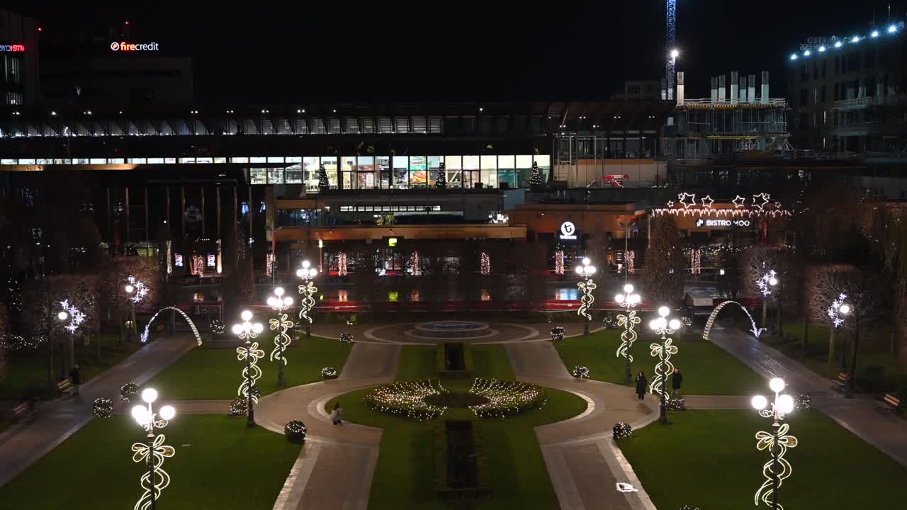 Iasi, Romania - December 10, 2021: Night view of Palas Mall beautifully illuminated with festive Christmas lights and street decorations