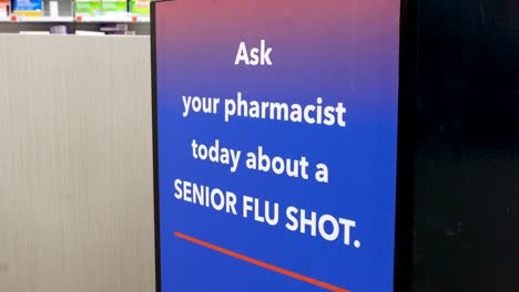 Señal-De-Vacuna-Contra-La-Influenza,-Pregúntele-A-Su-Farmacéutico-Hoy-Sobre-Una-Vacuna-Contra-La-Gripe-Para-Personas-Mayores