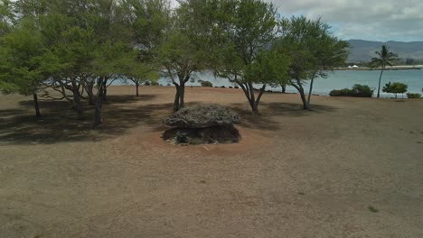 Aerial-view-of-balancing-rock-in-Kaiaka-bay-beach-park-in-Haleiwa-Oahu