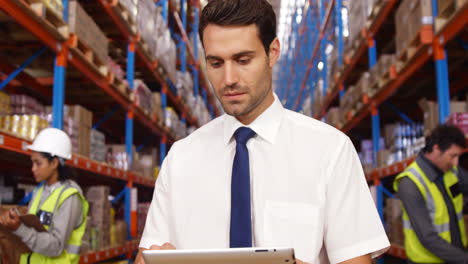 warehouse workers working together